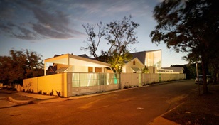An arresting addition to a suburban Perth house sits comfortably alongside its neighbours, thanks to Adrian Iredale's 'archaeological" approach and sympathetic material selection.